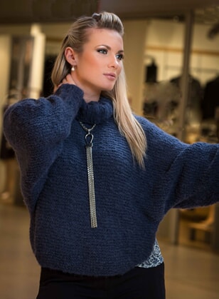 Ponchogenser strikket i Maya